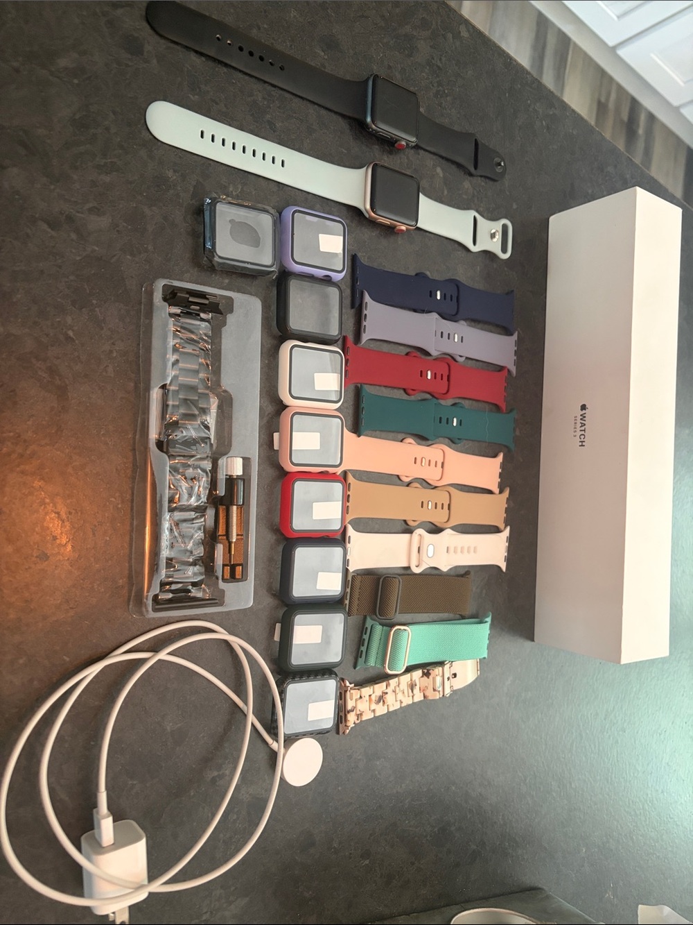 Apple Watch bundle with multiple colorful bands